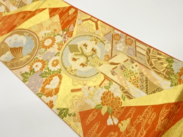 御所人形に向かい鶴・蝶・花々模様織出し袋帯